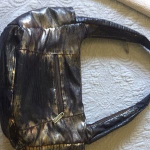 Slouchy all leather hand bag.